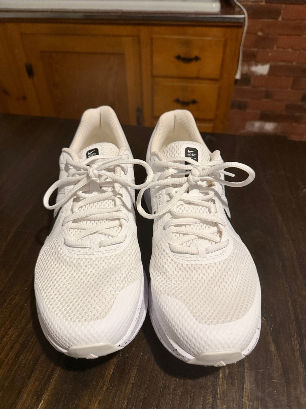 Nike White Mesh Athletic Sneakers with Black Swoosh